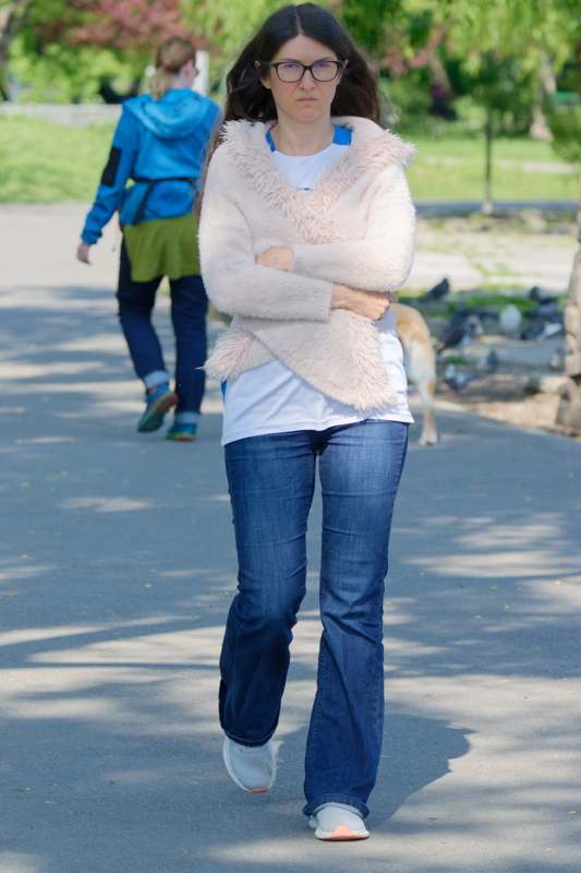 Young woman walking in the park